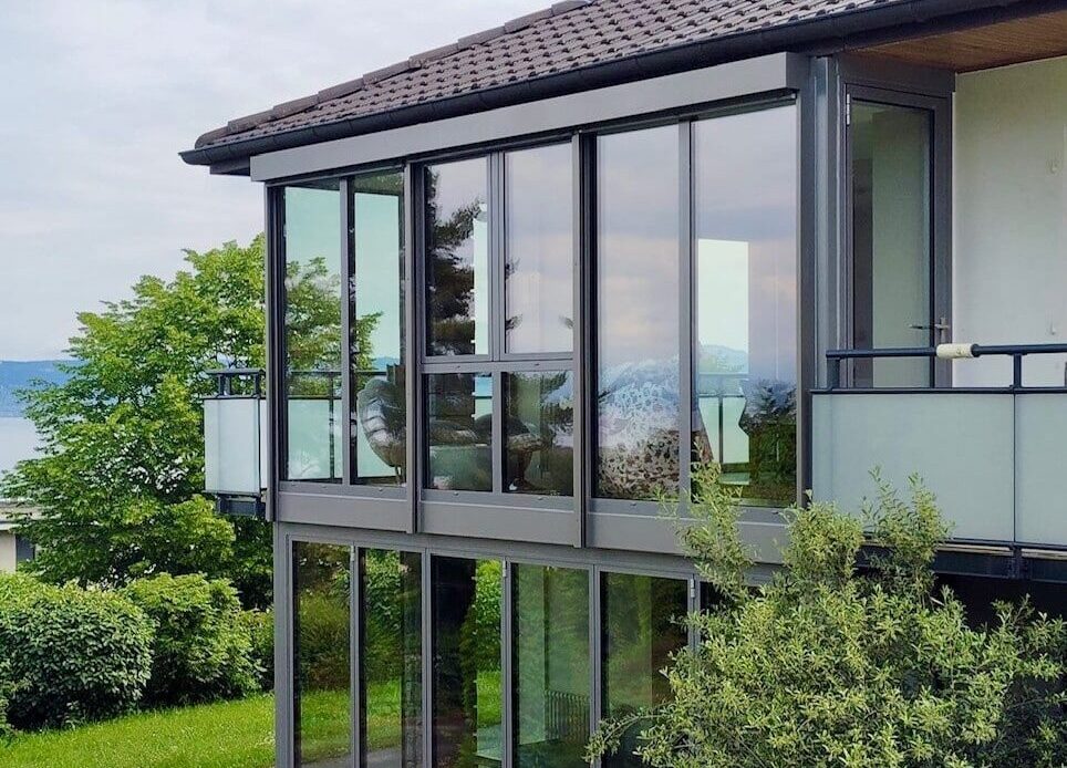 Extension vitrée sur deux niveaux avec vue sur le lac Léman (74) TRANSPARENCE CONCEPTION
